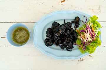 fried squid with squid ink sauce