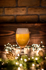 Christmas beer with christmas lights and background