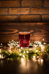Hot Spiced Christmas Mulled Wine with Christmas decoration. Heartwarming Mulled Red Wine with Christmas decoration