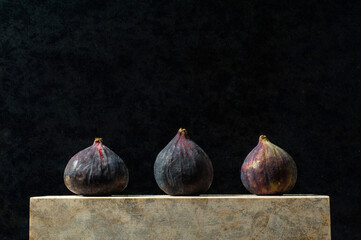 Fresh Figs On A Wooden Background