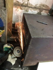 man auto mechanic working in a garage, workshop
