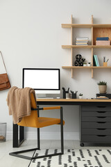 Stylish room interior with modern comfortable workplace