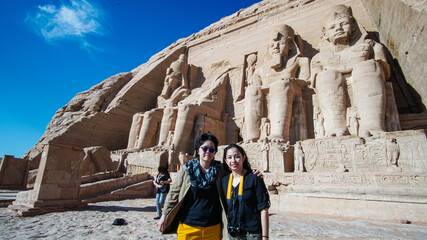 Asian tourist travel to Abu simbel temple historic landmark of Egypt