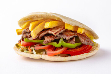 Kebab, pita, gyros, shaurma, wrap sandwich. Street food. Takeaway food.