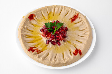 Hummus. A dish of crushed chickpeas for delivery, or  online store. Isolated on a white background.