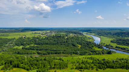 Fototapeta na wymiar Aerial view of Ugra river, Zviszhy village and Ugra national park. Kaluga oblast, Russia.