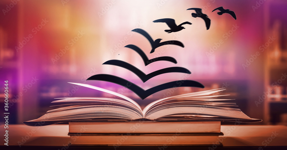 Poster a fantasy abstract image opens the book where the paper floats out of the book, turning into a bird 