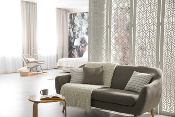 Apartment interior with modern living room and cozy bedroom