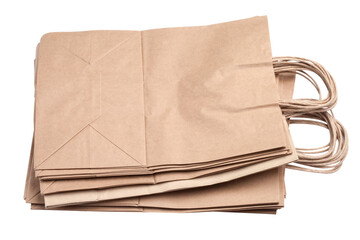 Pile of many small brown eco new paper recyclable paper bags food details abstract background texture pattern macro, closeup. A lot of simple easy food packaging stacked abstract background