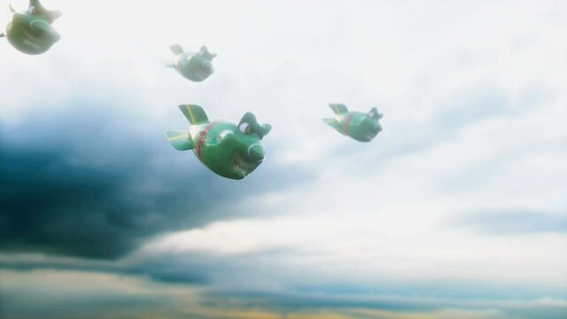 Falling crazy bombs against the dark sky. Funny bombs.