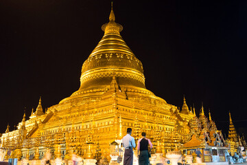 Shwezigon Paya Golden Temple at night in Bagan,...