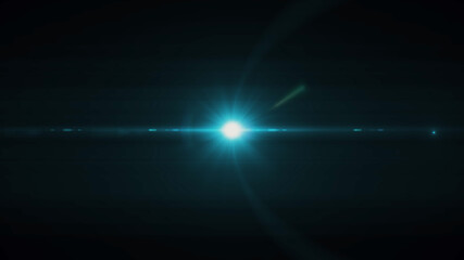 Anamorphic lens flare from a photo camera lens. Anamorphic background.