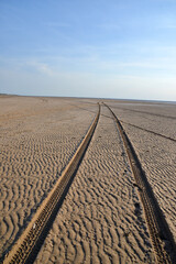 Naklejka premium Tyre Tracks on the beach at Sandscales, near Barrow in Furness, Cumbria, England, UK