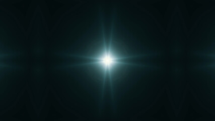 Beautiful lens flare with rays on a black background.