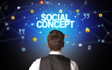 Rear view of a businessman with SOCIAL CONCEPT inscription, social networking concept