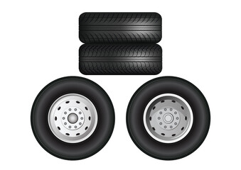 Stacked truck wheels.