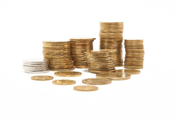 Stacks of coins on a white background.