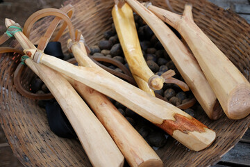 Wooden catapult and ammunition Mold from clay in basket