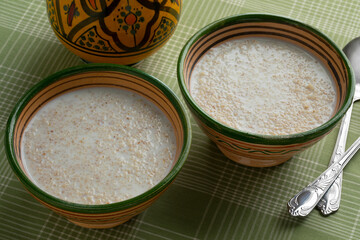 Fototapeta na wymiar Traditional ceramic bowl with Moroccan belboula saikouk