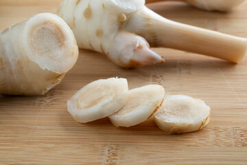 Fresh piece and slices of Galangal rhizome