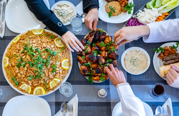 happy muslim family eating togther