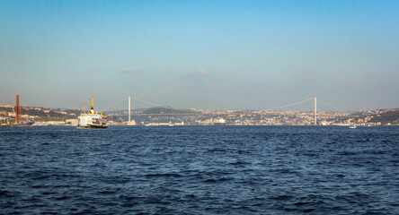 15 July Martyrs Bridge is fully visible while traditional classic ferries are sailing from one...