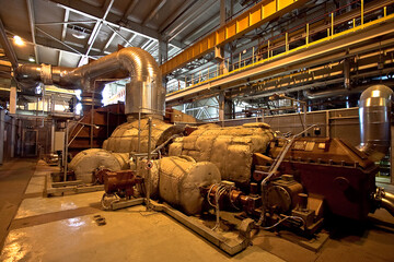 Daytime general view of the process pipelines for the supply of water and steam. General view of the process pipelines. General view of the pipes.