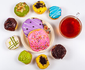 Pink Donut and tea Flat Lay View