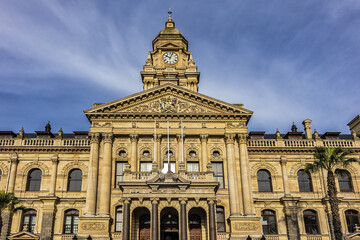 Fragments of Cape Town City Hall facade. On Cape Town's Grand Parade stands an imposing Italian Renaissance style Edwardian building constructed from honey limestone in 1900. Cape Town, South Africa.