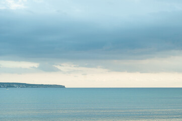 Empty beach, no people, no tourists. Sentimental holiday landscape from Mallorca island Spain, travelling in Europe. Quiet, calm vacation atmosphere on a quiet beach, sea and sky on the background