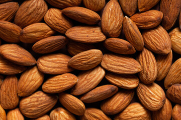 Background of raw almond. Nut texture. Close-up. 