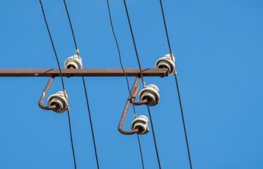 cable clutter on electric pole and street lamp