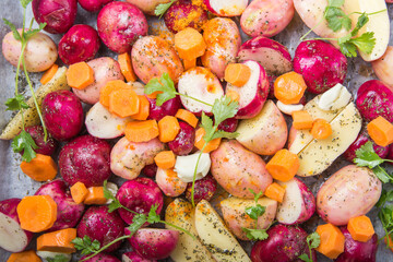  raw purple mix potatoes ready to be roasted.  top view. Crop image. Multi Colored Food