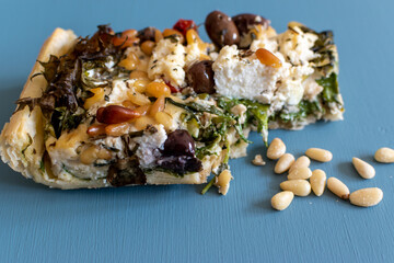 quiche with feta cheese and pine nuts 
