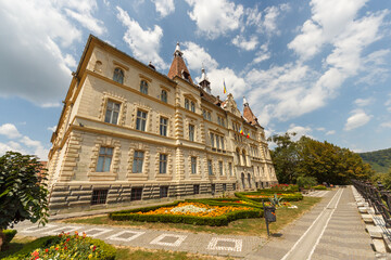 SIGHISOARA, ROMANIA - Circa 2020: Old medieval town with cloudy blue sky. Beautiful tourist spot in eastern central Europe. Famous old medieval council house in Sighisoara Romania