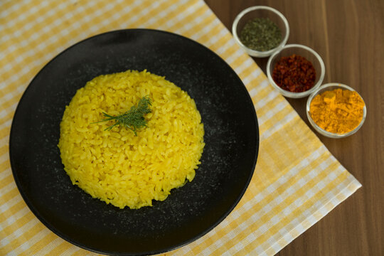 cooking rice with Curcuma Longa, turmeric or Zerdecal for healthy life