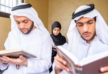 Happy msulim family reading Quran togther