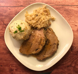Roast pork with gravy, dumpling and 