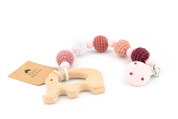 wooden elephant with knitted balls