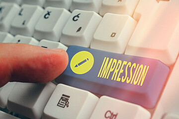 Writing note showing Impression. Business concept for an idea and feeling or opinion about something or someone White pc keyboard with empty note paper above white key copy space