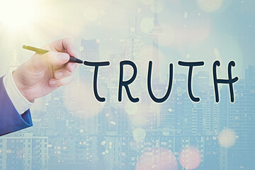 Conceptual hand writing showing Truth. Concept meaning used to mean being in accord with fact...