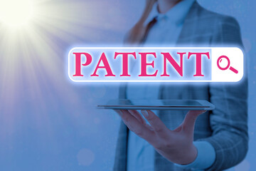 Text sign showing Patent. Business photo text intellectualproperty that gives owner legal right has...
