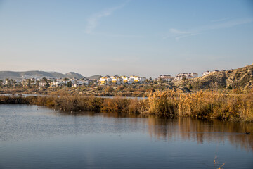Fototapeta na wymiar Lake of Palomares with the towm in background near of the Vera Playa, Andalusia, Spain