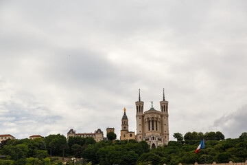 Fototapeta premium Lyon, France - CIRCA 2019: Picturesque historical Lyon Old Town buildings on the bank of Saone River. Lyon, Region Auvergne-Rhone-Alpes, France.