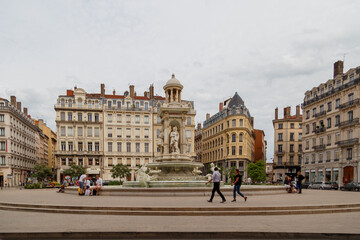 Obraz premium Lyon, France - CIRCA 2019: Picturesque historical Lyon Old Town buildings on the bank of Saone River. Lyon, Region Auvergne-Rhone-Alpes, France.