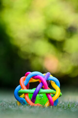 colorful rubber toy, on the grass