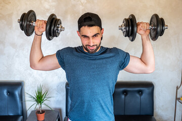 Guy doing some training at home to keep in good shape