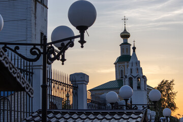 Fototapeta na wymiar Old church domes on morning sunlight