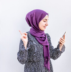 Arabic muslim woman talking on the phone