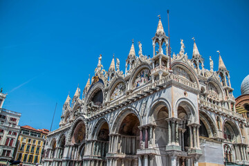 View of Basilica di San Marco and on piazza San Marco in Venice, Italy. Architecture and landmark of Venice. Sunrise cityscape of Venice.